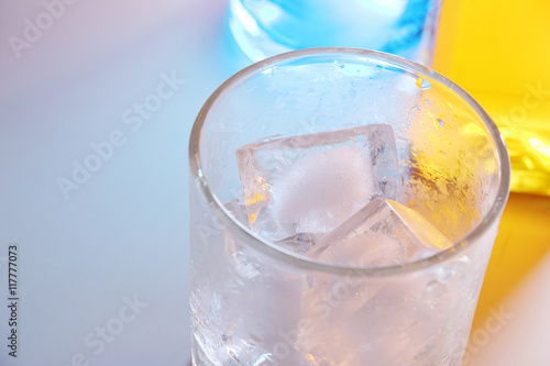 Close up of the ice cubes in glass background