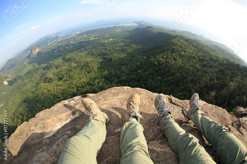 hiking legs enjoy the view on mountain peak
