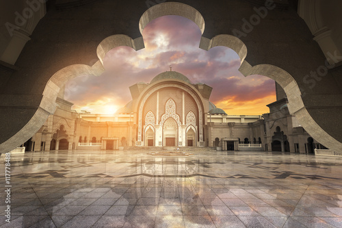 Wallpaper Mural In framming Muslim pray at the mosque with harsh sunset light