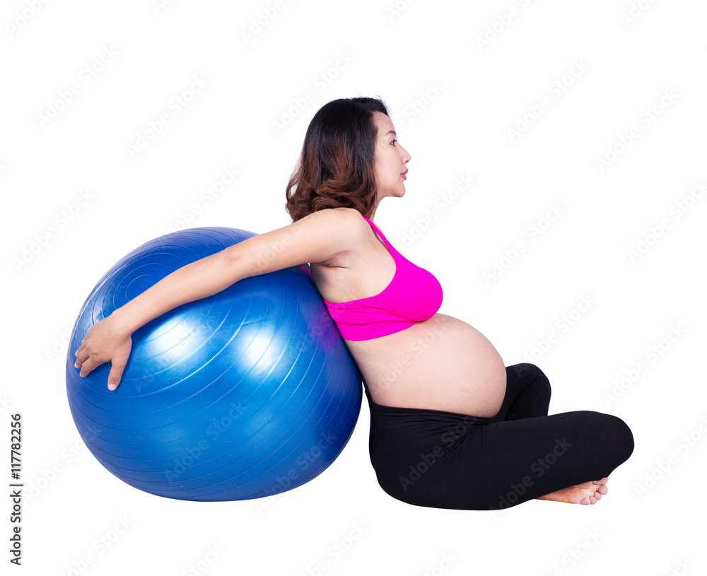 Pregnant woman with fitness ball on white background
