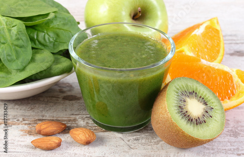 Wallpaper Mural Ingredients and fresh cocktail from spinach on wooden background, healthy nutrition Torontodigital.ca