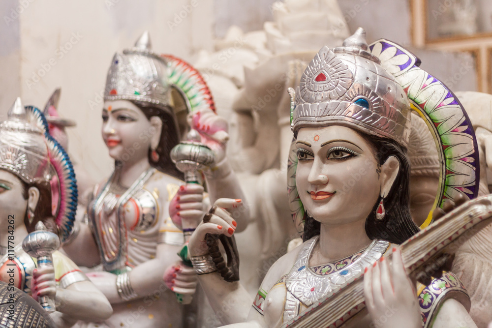 A shop selling large marble Hindu deities in India.