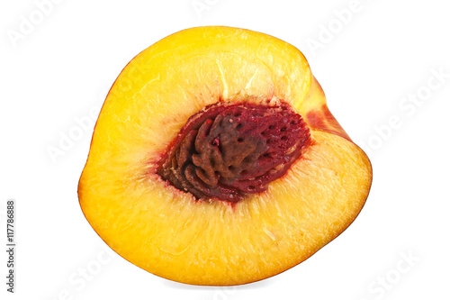 Nectarine fruit half isolated on white background, close up