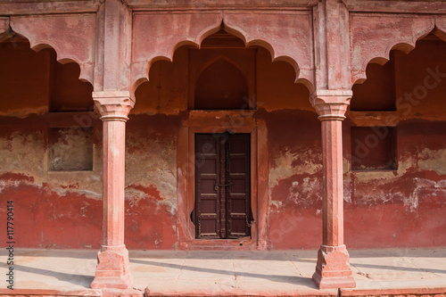 An old sandstone archway in the palace grounds of the Taj Mahal of Agra, India.