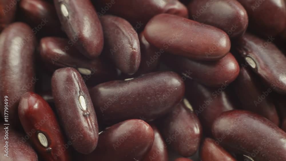 Red Haricot Beans. Close up slow panorama. Macro shot.