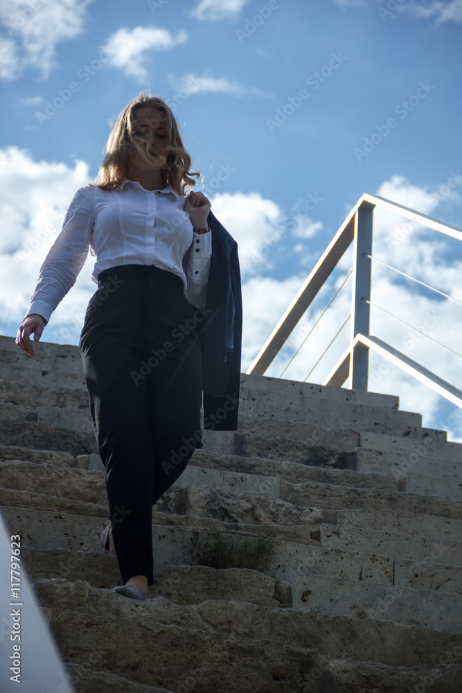 business woman on stairs