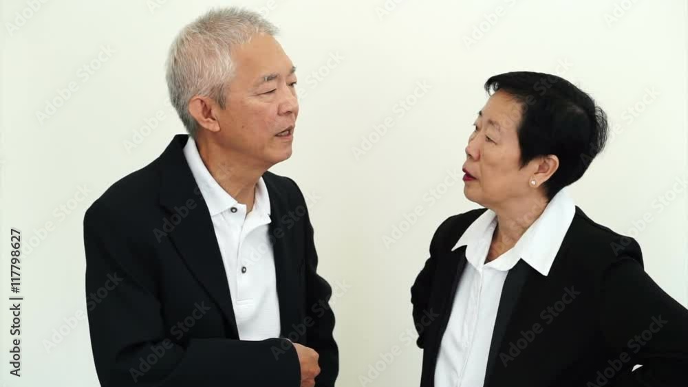 Asian Senior management level discussing Business together Asian Senior management level discussing Business together