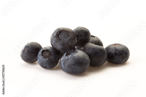 some blueberries on a white background