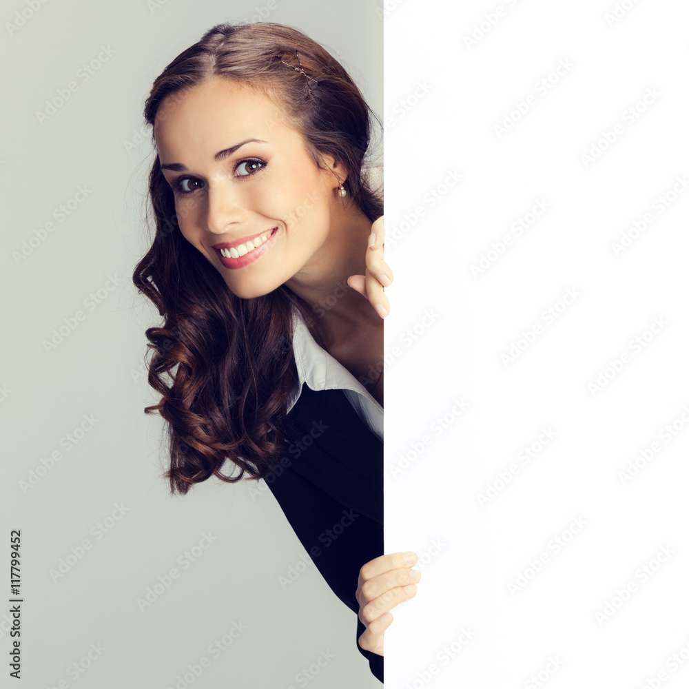 Businesswoman showing signboard Businesswoman showing signboard