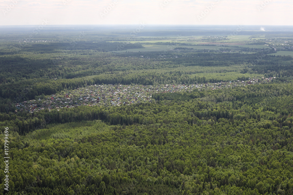 Obraz premium Aerial Views - Russian village in the wood