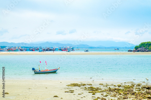 Fishing boat in blue sea at blue sky Landscape view of sea Summe