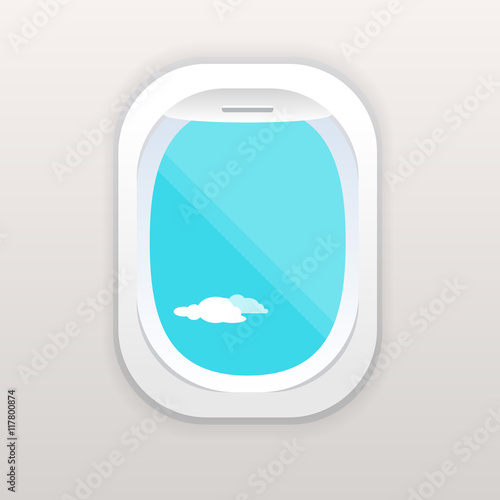 Aircraft window with cloudy blue sky outside