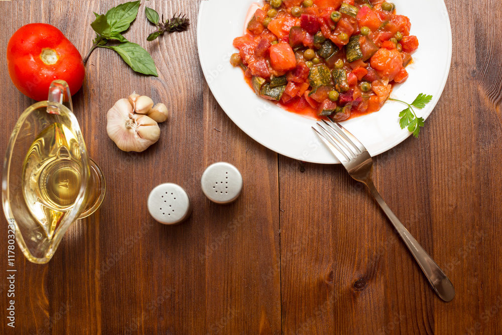 Fresh vegetable stew on wooden background Fresh vegetable stew on wooden background