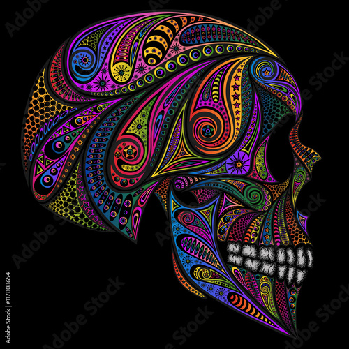 Colored human skull from various patterns on a black background
