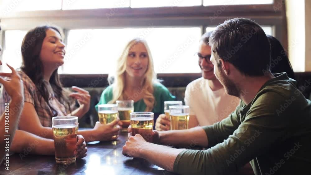 happy friends drinking beer at bar or pub happy friends drinking beer at bar or pub