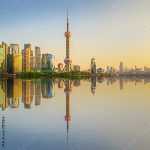 Cityscape of Shanghai and Huangpu River on sunset  beautiful reflection on skyscrapers  China