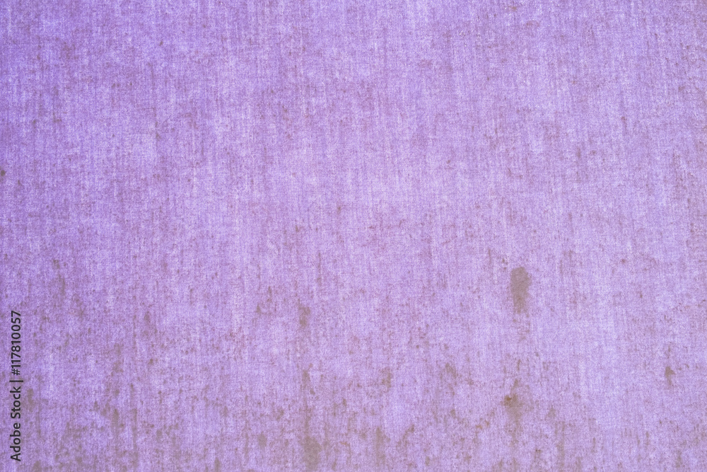 Fototapeta premium close up surface/pattern of light purple canvas with dark stain. background texture