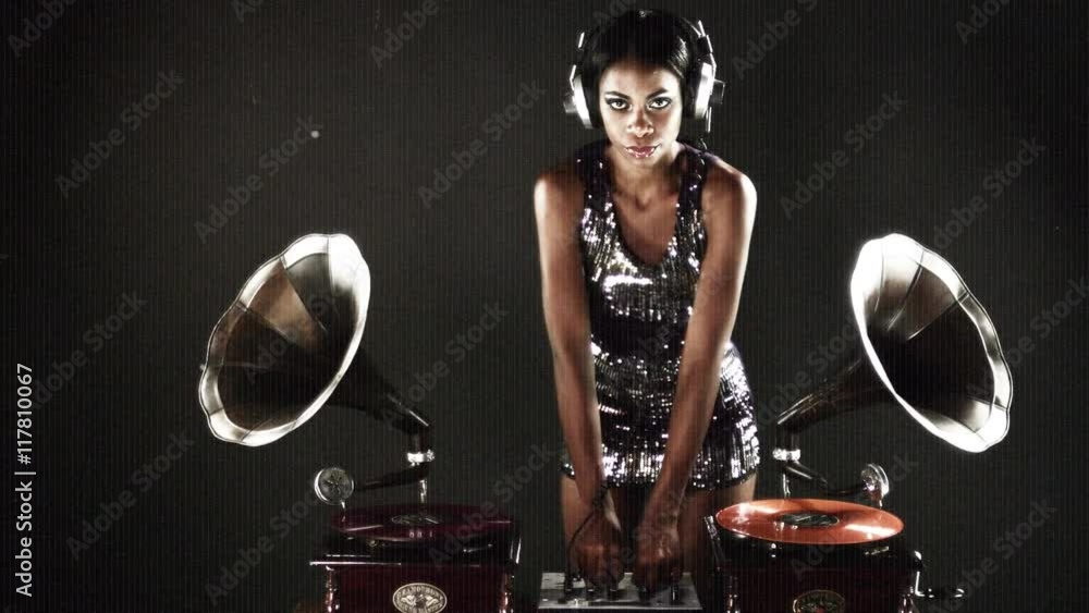 young woman djs using retro antique gramophones