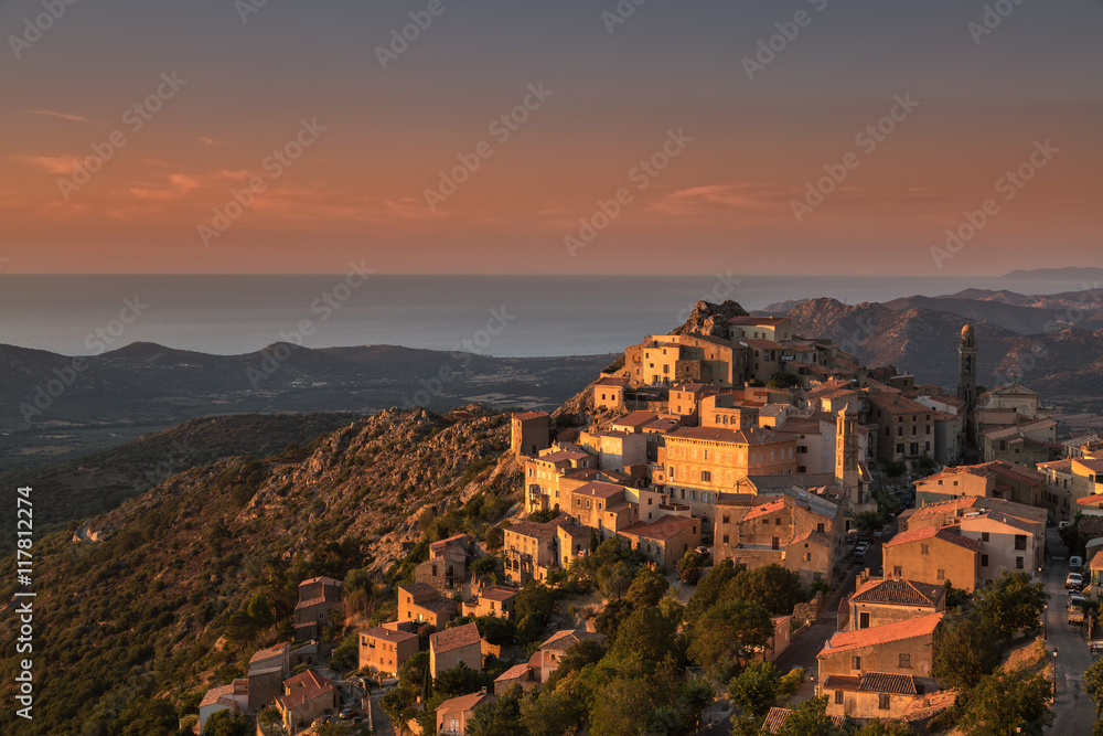 Late evening sunshine on mountain village of Speloncato in Corsi