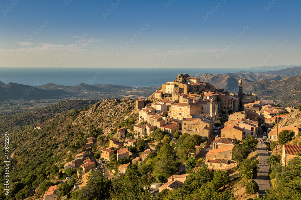 Evening sun on mountain village of Speloncato in Corsica