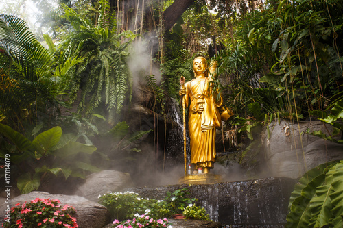 Gold statue of a Buddha in Thailand. © zuzabax