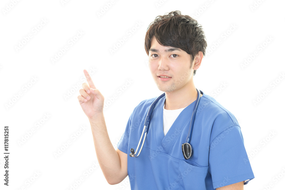 指示する笑顔の医師 指示する笑顔の医師