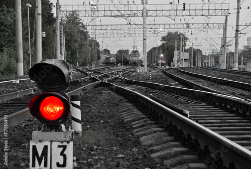 red semaphore signal on railway in the summer