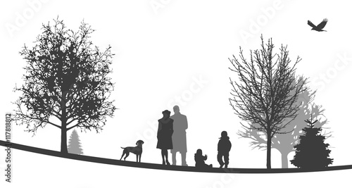 Winterliche Landschaft | Junge Familie spielt mit Hund im Park