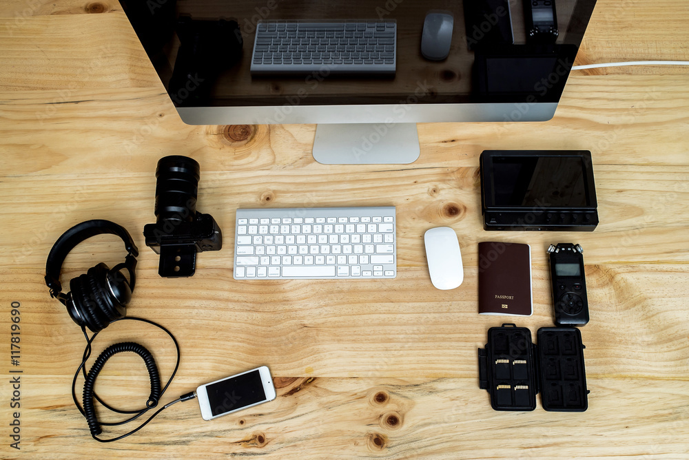 Top view office computer PC camera, mobile phone, headphone,sound  recorder,passport,memory card,keyboard and mouse on wooden desk Stock Photo  | Adobe Stock