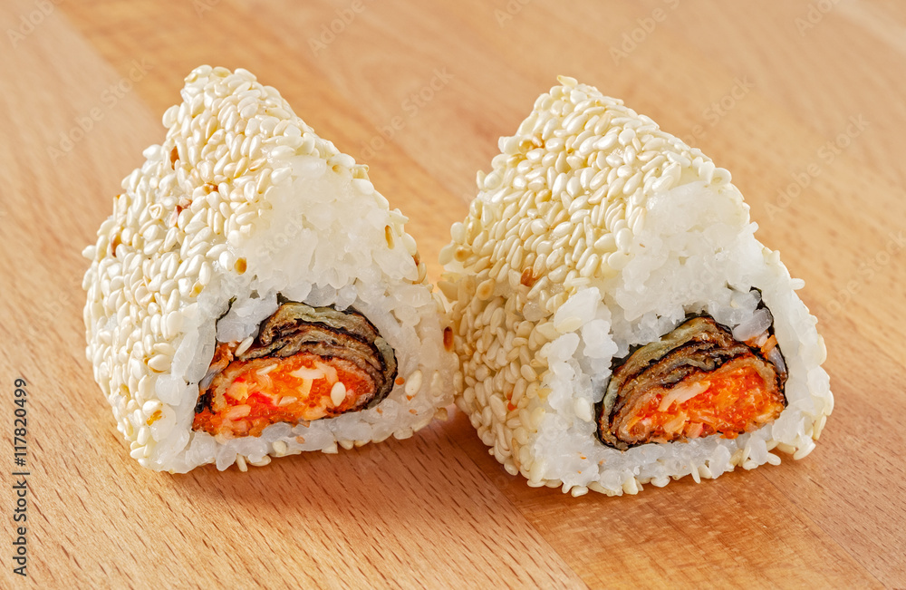 Maki Sushi Roll with Red Tobiko and Sesame Stock Photo | Adobe Stock