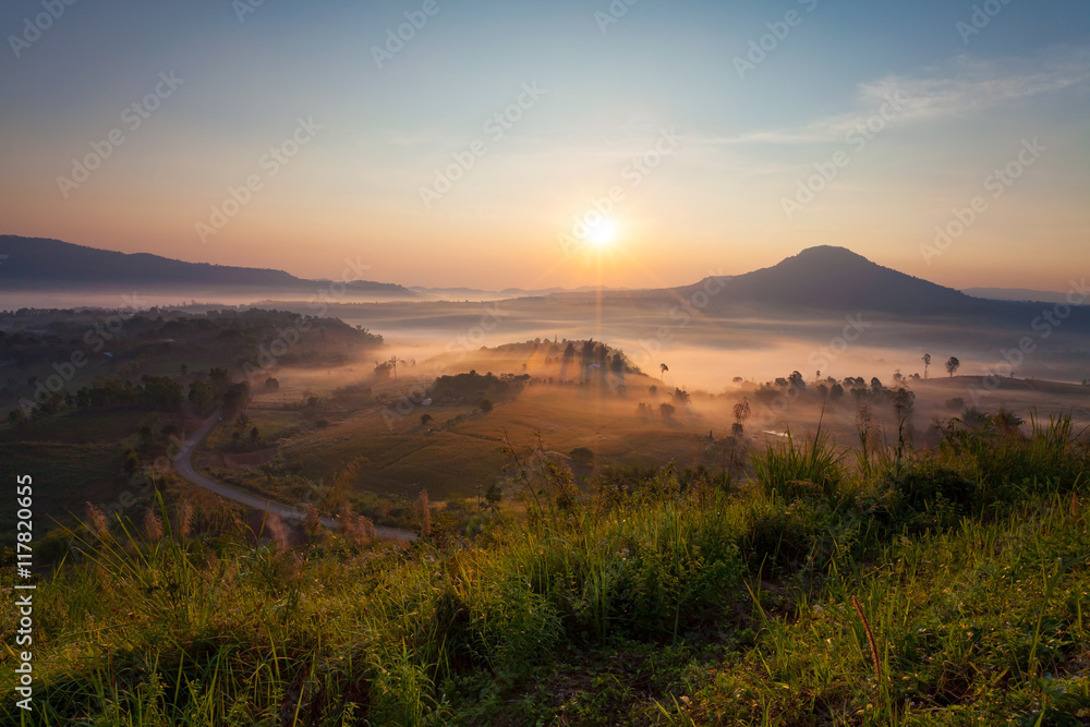 Misty morning sunrise in Khao Takhian Ngo View Point at Khao-kho