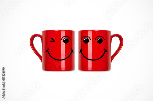 red coffee cup with smile.