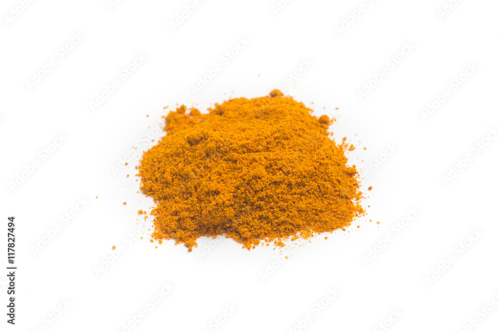 Close-up on a Turmeric powder in white background Close-up on a Turmeric powder in white background