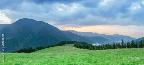 Summer landscape with the sunset in the mountains