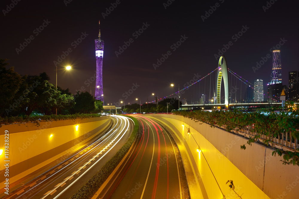 Fototapeta premium Empty road floor at car light trail of night scene