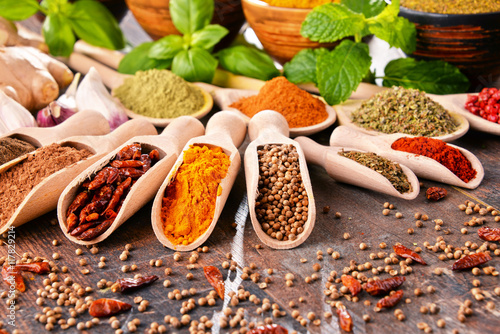 Fototapeta Naklejka Na Ścianę i Meble -  Variety of spices on kitchen table