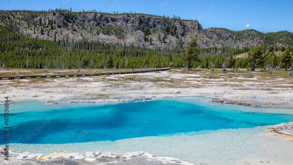 Sapphire Pool hot spring  is one of the most beautiful blue pools in the park. Vivid landscape at Biscuit Basin, Yellowstone National Park, Wyoming
