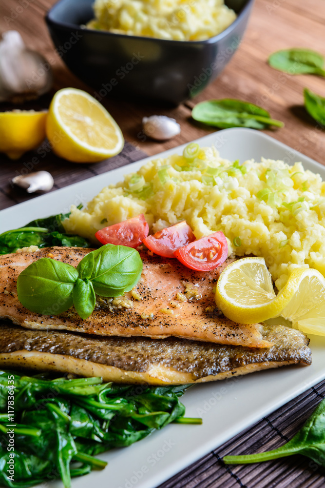 Baked trout fillet with mashed potatoes and steamed spinach Baked trout fillet with mashed potatoes and steamed spinach