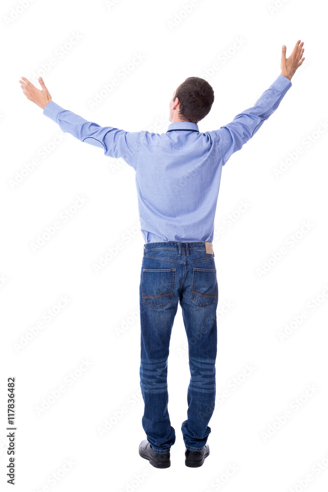 back view of cheerful young businessman celebrating something is back view of cheerful young businessman celebrating something is