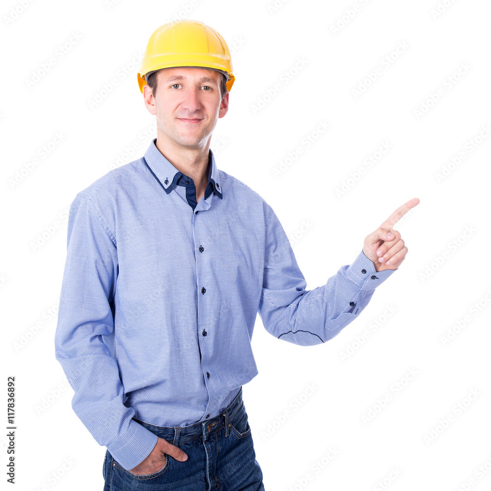 middle aged business man or architect in yellow builder's helmet middle aged business man or architect in yellow builder's helmet