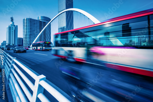 urban traffic on bridge with cityscapein background