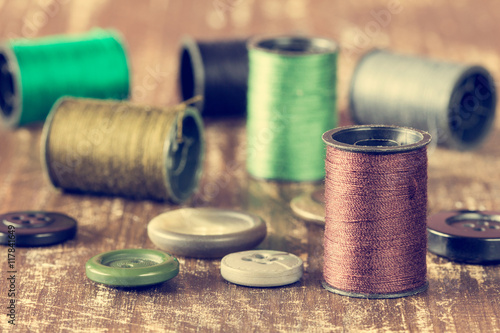Spools of thread and buttons