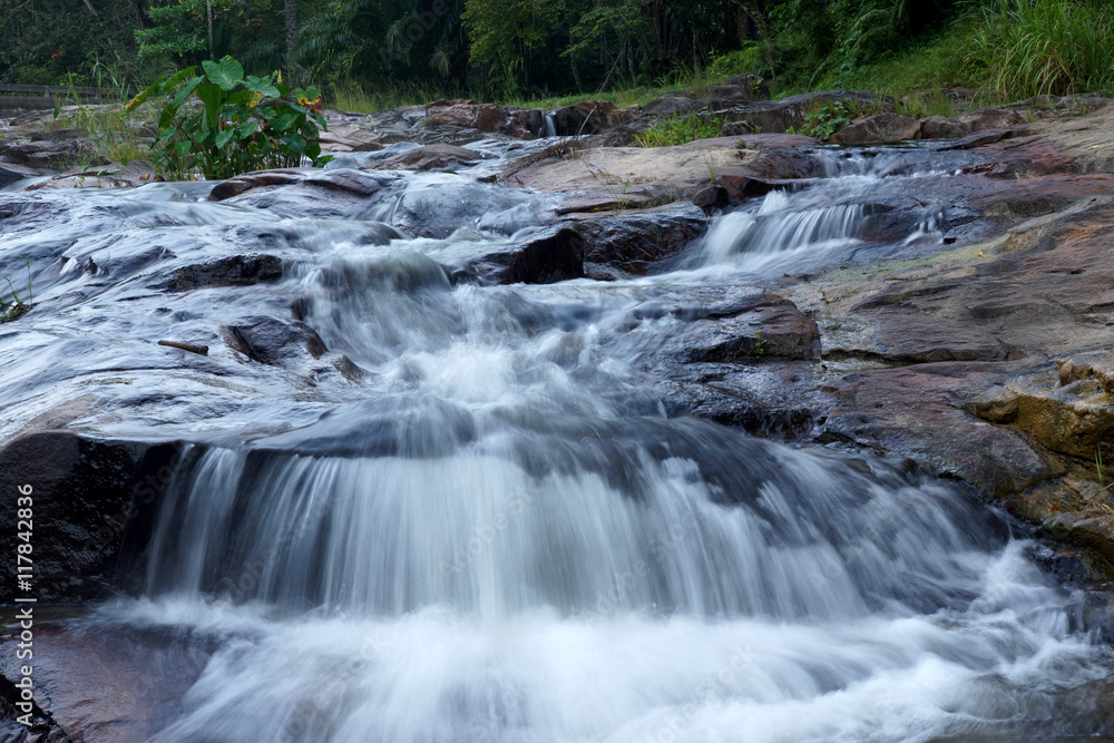 Obraz premium Waterfall in tropical forest.