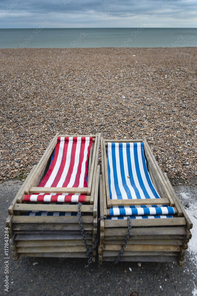 postcards from the sea, colorful deck chairs on the pebble beach postcards from the sea, colorful deck chairs on the pebble beach