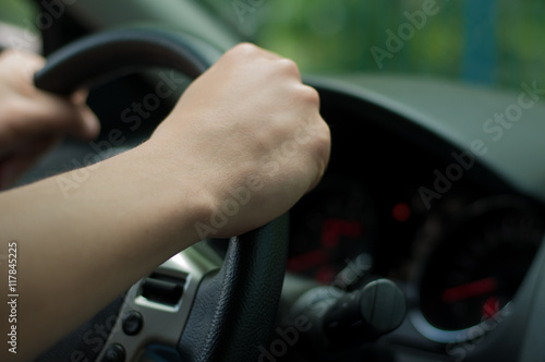 male hands on steering wheel of car © mikhasik
