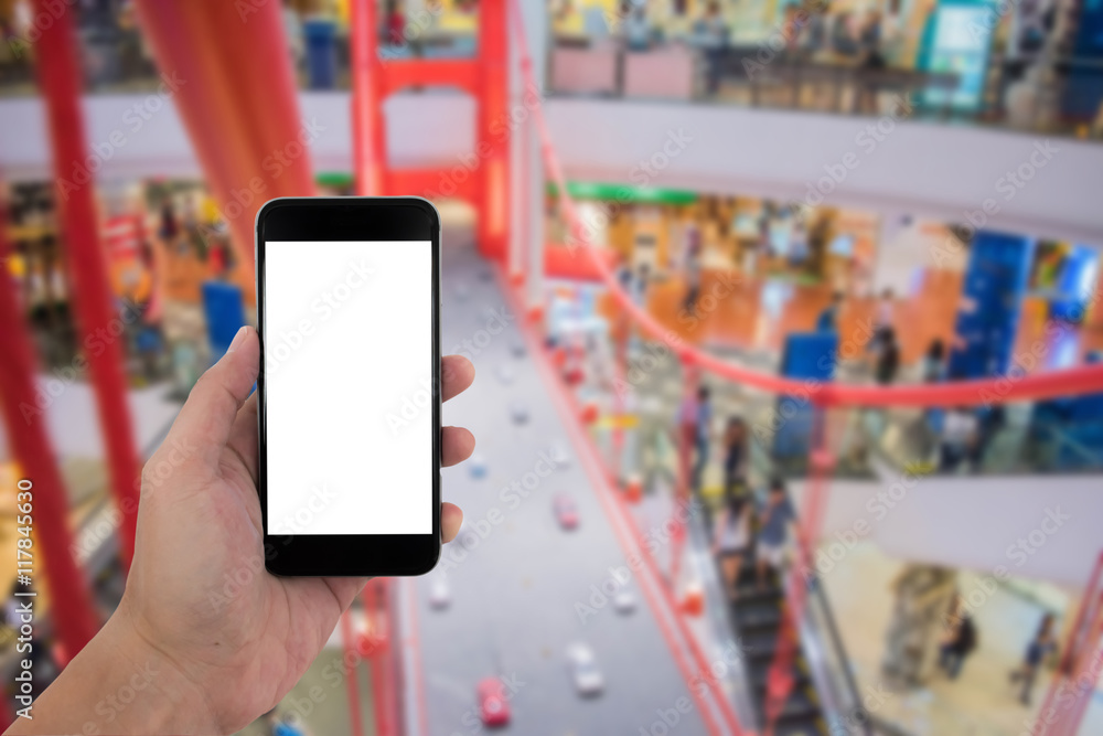man hand holding the phone and white screen with blur background man hand holding the phone and white screen with blur background