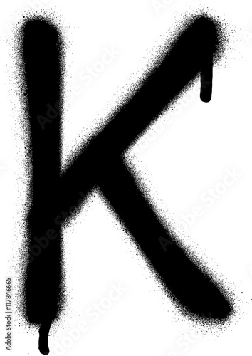 sprayed K font graffiti with leak in black over white