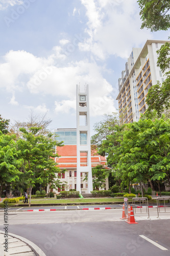 Bangkok, Thailand - June 5, 2016: Memory hall and clock tower of Chulalongkorn university, Bangkok,Thailand. photo