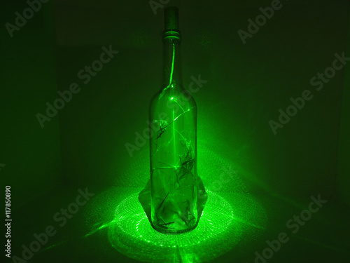 Glass bottle in laser abstraction