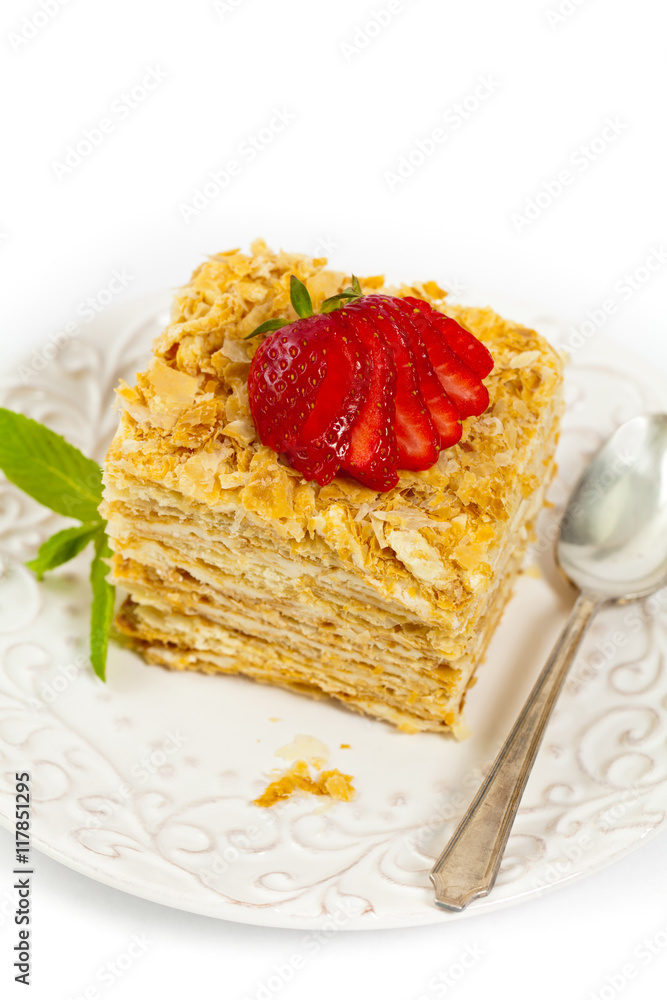 Puff Pastry Napoleon Cake Isolated on a white background. Selective focus. Puff Pastry Napoleon Cake Isolated on a white background. Selective focus.